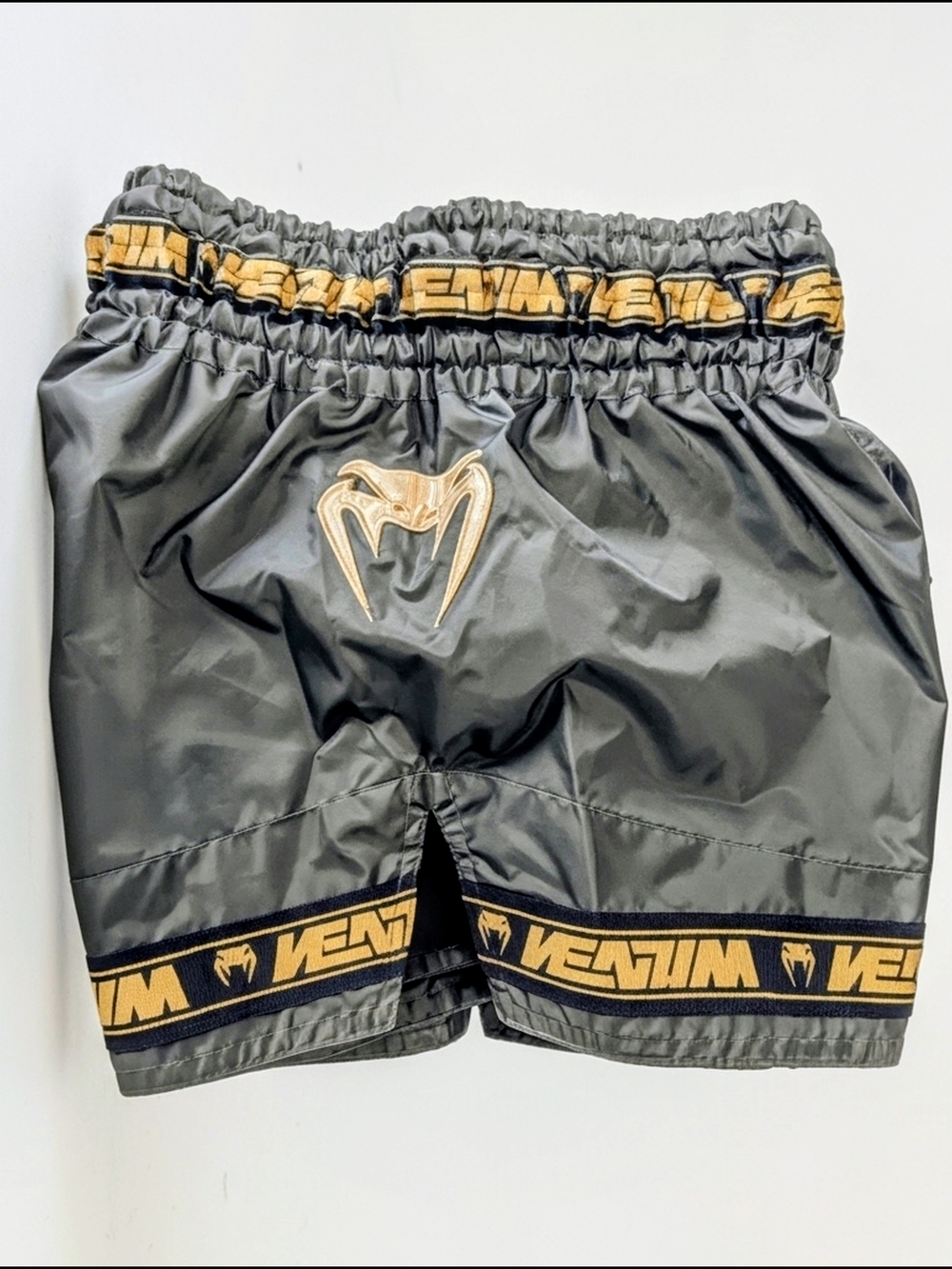 Venum Men's Green Muay Thai Parachute Shorts with Gold Trim